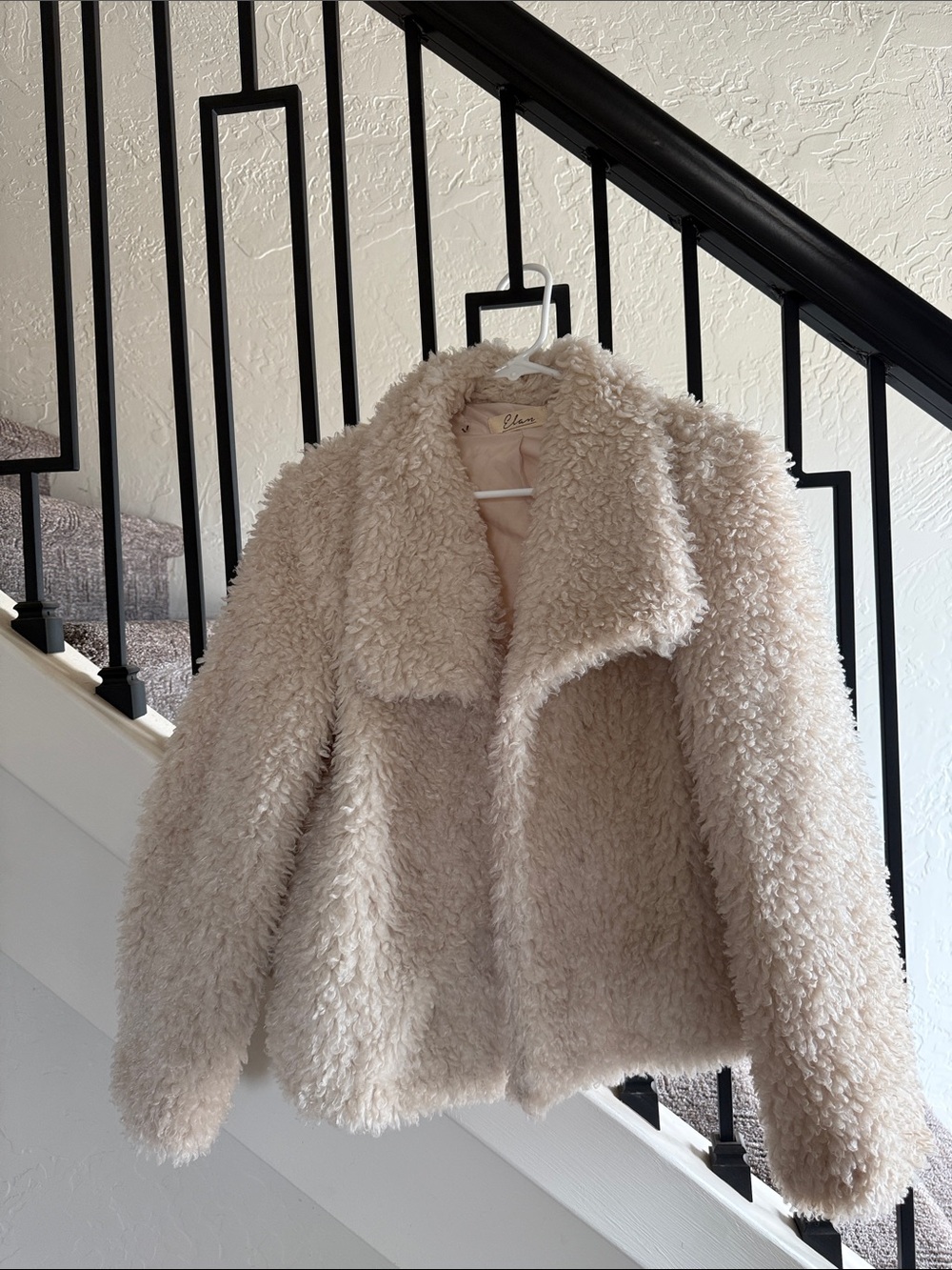 White faux shearling coat